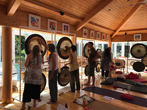Students learning the gong